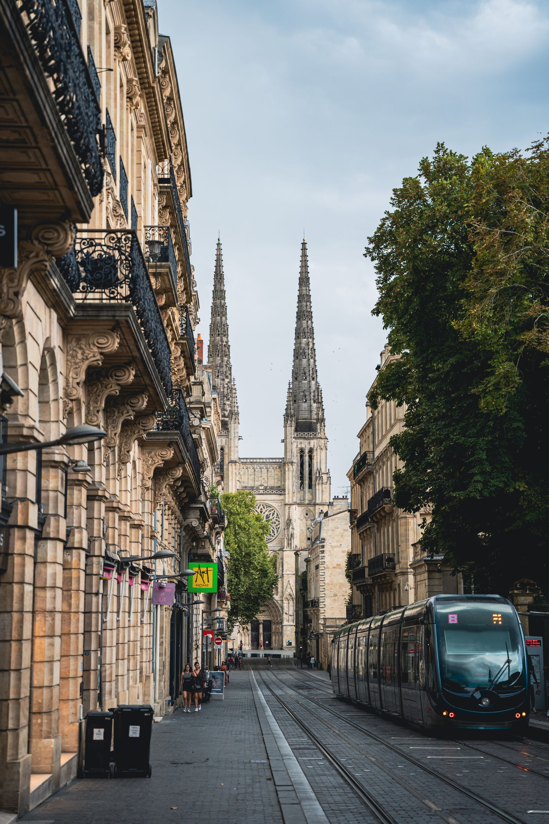 Bordeaux cathedral behind a passing tram
