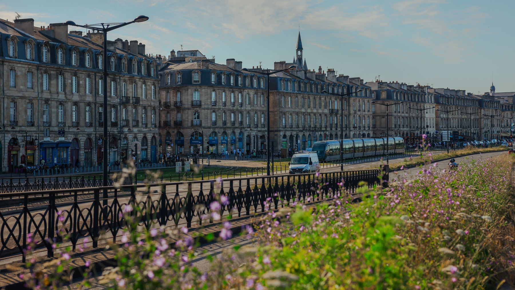 A tram on a historic Bordeaux street