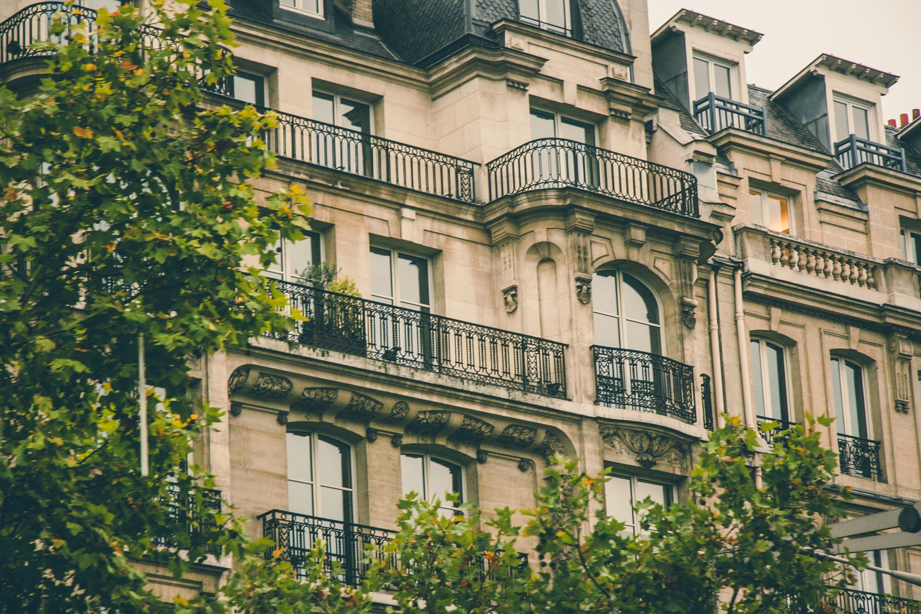 Classic Parisian architecture with stone facades and balconies